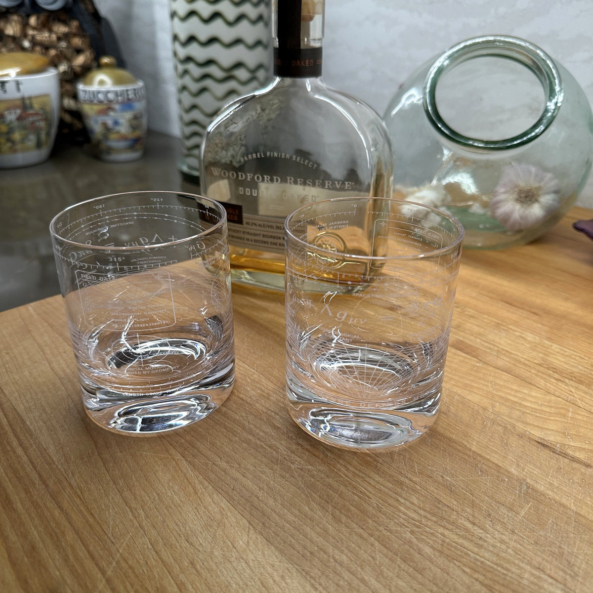 Two Vector Einstein Field Equation crystal rocks glasses in a refined home bar setting